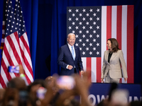 President Joe Biden and Vice President Kamala Harris arrive on stage to raucous applause as they announce reduced Medicare prices for ten wi...