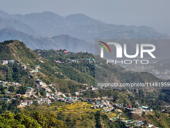 A mountainous landscape is appearing in Mussoorie, Uttarakhand, India, on April 18, 2024. (