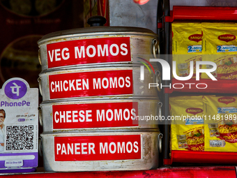 A roadside restaurant is offering momos and Maggi noodles along Mall Road in Mussoorie, Uttarakhand, India, on April 18, 2024. (