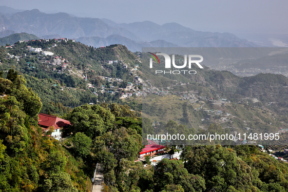 A mountainous landscape is appearing in Mussoorie, Uttarakhand, India, on April 18, 2024. 