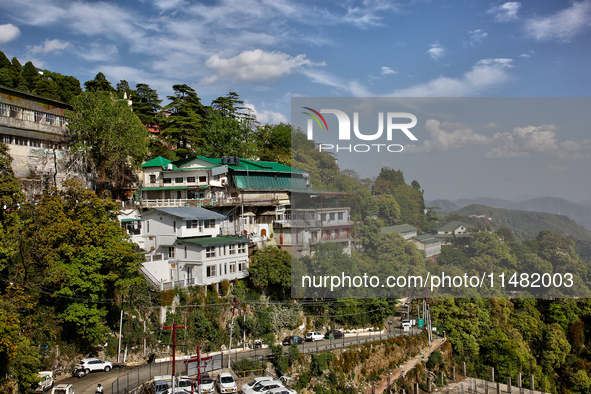 Buildings are being seen along the mountainside in Mussoorie, Uttarakhand, India, on April 18, 2024. 