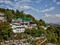 Buildings are being seen along the mountainside in Mussoorie, Uttarakhand, India, on April 18, 2024. (