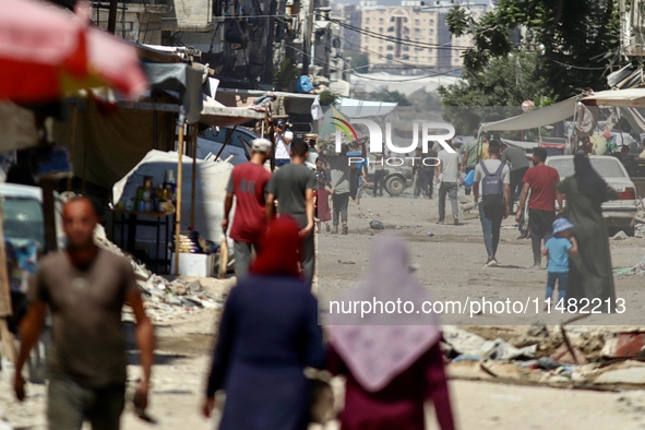 Palestinians in Khan Yunis, Palestine, on August 15, 2024, are experiencing daily life with the continuous targeting and killings of defense...