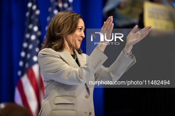 Vice President Kamala Harris applauds President Joe Biden at the conclusion of his remarks at an event announcing reduced Medicare prices fo...