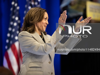 Vice President Kamala Harris applauds President Joe Biden at the conclusion of his remarks at an event announcing reduced Medicare prices fo...