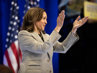 Vice President Kamala Harris applauds President Joe Biden at the conclusion of his remarks at an event announcing reduced Medicare prices fo...