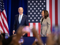 President Joe Biden and Vice President Kamala Harris arrive on stage to raucous applause as they announce reduced Medicare prices for ten wi...