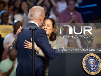 Vice President Kamala Harris embraces President Joe Biden after introducing him at an event announcing reduced Medicare prices for ten widel...