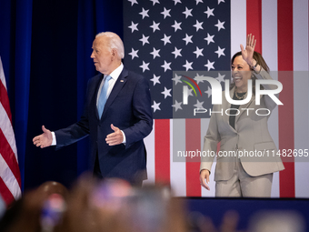 President Joe Biden and Vice President Kamala Harris react to raucous applause as they announce reduced Medicare prices for ten widely-used...