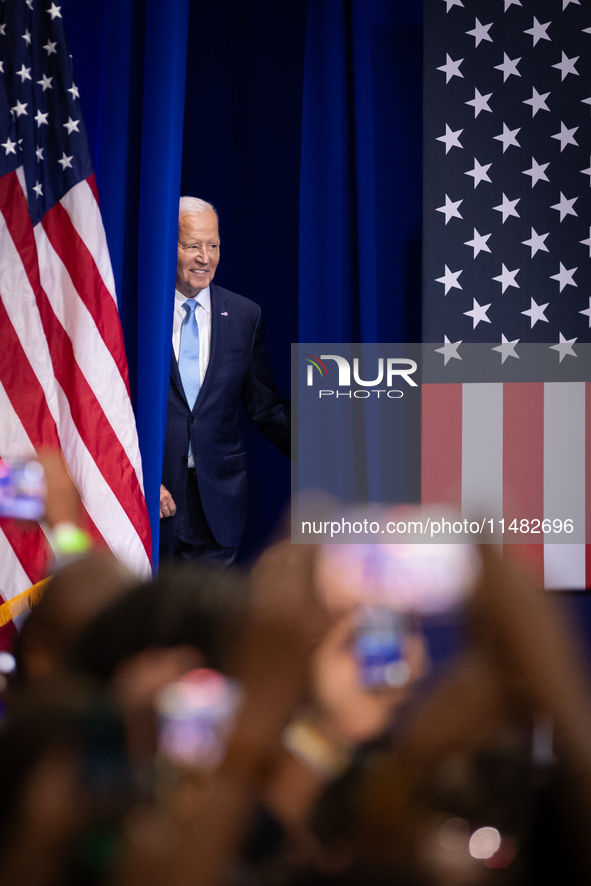 President Joe Biden steps onto the stage to announce a reduction in Medicare prices for ten widely-used drugs, Upper Marlboro, MD, August 15...