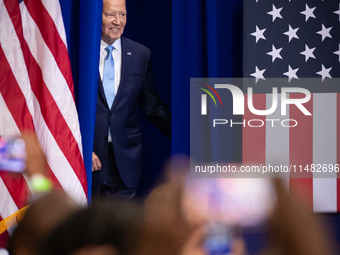 President Joe Biden steps onto the stage to announce a reduction in Medicare prices for ten widely-used drugs, Upper Marlboro, MD, August 15...