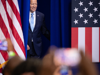 President Joe Biden steps onto the stage to announce a reduction in Medicare prices for ten widely-used drugs, Upper Marlboro, MD, August 15...