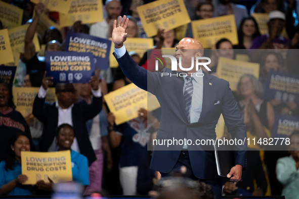 Gov. Wes Moore (D-MD) waves to the audience prior to delivering remarks at an event announcing reduced Medicare prices for ten widely-used d...