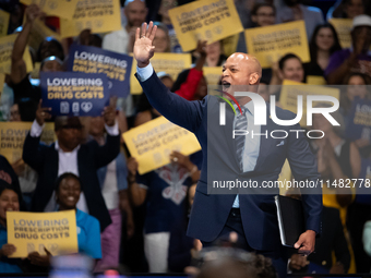 Gov. Wes Moore (D-MD) waves to the audience prior to delivering remarks at an event announcing reduced Medicare prices for ten widely-used d...