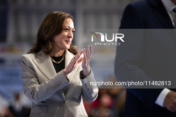 Vice President Kamala Harris applauds President Joe Biden at the conclusion of his remarks at an event announcing reduced Medicare prices fo...