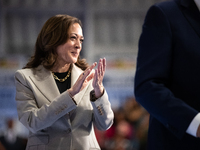 Vice President Kamala Harris applauds President Joe Biden at the conclusion of his remarks at an event announcing reduced Medicare prices fo...