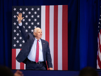 Sen. Ben Cardin (D-MD) waves as he walks on stage at an event announcing reduced Medicare prices for ten widely-used drugs, Upper Marlboro,...