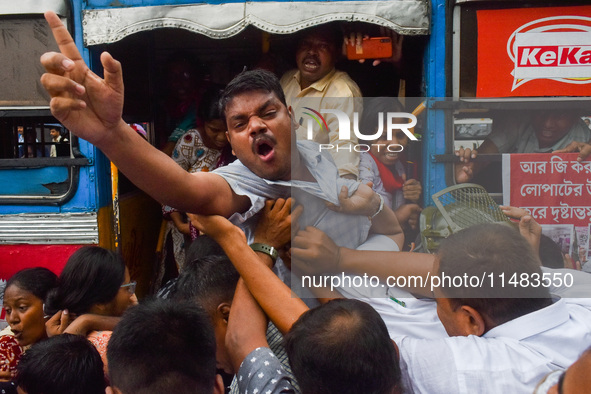 Clashes are being seen between students and police during a protest demonstration against the rape and murder of a second-year doctor at RG...