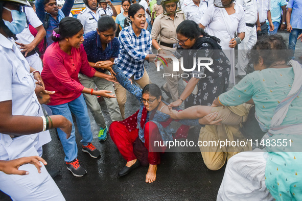 Clashes are being seen between students and police during a protest demonstration against the rape and murder of a second-year doctor at RG...