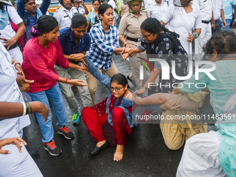 Clashes are being seen between students and police during a protest demonstration against the rape and murder of a second-year doctor at RG...