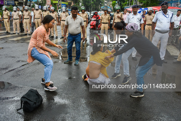 Clashes are being seen between students and police during a protest demonstration against the rape and murder of a second-year doctor at RG...