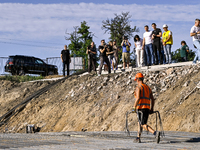 Ivan Fedorov, of the Zaporizhzhia Regional Military Administration, is inspecting the progress of underground school construction in the Shy...