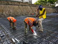 Builders are working at an underground school construction site in the Shyroke community, Zaporizhzhia region, southeastern Ukraine, on Augu...