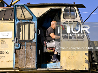 A builder is working at an underground school construction site in the Shyroke community, Zaporizhzhia region, southeastern Ukraine, on Augu...