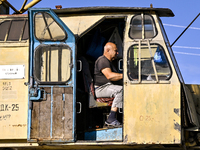 A builder is working at an underground school construction site in the Shyroke community, Zaporizhzhia region, southeastern Ukraine, on Augu...