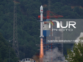 A Long March-4B carrier rocket is lifting off a remote sensing 4301 satellite from the Xichang Satellite Launch Center in Sichuan, China, on...