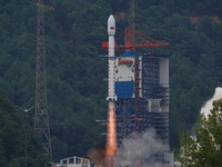 A Long March-4B carrier rocket is lifting off a remote sensing 4301 satellite from the Xichang Satellite Launch Center in Sichuan, China, on...