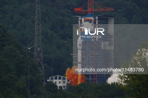 A Long March-4B carrier rocket is lifting off a remote sensing 4301 satellite from the Xichang Satellite Launch Center in Sichuan, China, on...