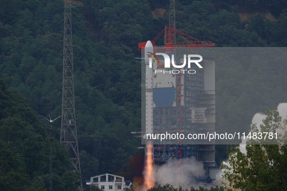 A Long March-4B carrier rocket is lifting off a remote sensing 4301 satellite from the Xichang Satellite Launch Center in Sichuan, China, on...