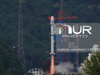 A Long March-4B carrier rocket is lifting off a remote sensing 4301 satellite from the Xichang Satellite Launch Center in Sichuan, China, on...