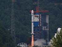 A Long March-4B carrier rocket is lifting off a remote sensing 4301 satellite from the Xichang Satellite Launch Center in Sichuan, China, on...