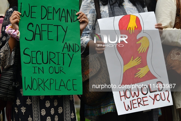 Women are protesting against rape in Dhaka, Bangladesh, on August 16, 2024, following the rape and murder of a doctor in India. 