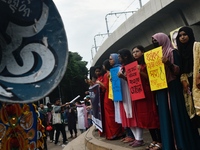 Women are protesting against rape in Dhaka, Bangladesh, on August 16, 2024, following the rape and murder of a doctor in India. (