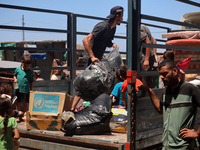 Palestinians are fleeing with their belongings in Deir el-Balah, in the central Gaza Strip, on August 16, 2024, amid the ongoing conflict be...