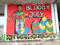 Students are painting graffiti on a wall alongside a road to express their message after the fall of Bangladesh's former Prime Minister Shei...