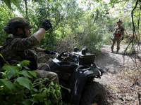 Servicemen of the Motorised Rifle Battalion of the 93rd Kholodnyi Yar Separate Mechanized Brigade of the Ukrainian Armed Forces are at their...