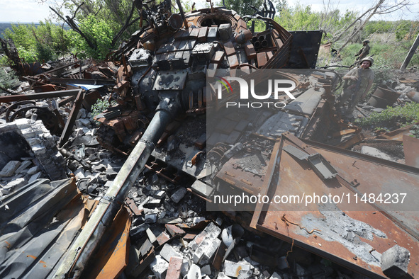 A Ukrainian tank destroyed by a Russian ZALA Lancet loitering munition during fighting in the Bakhmut direction in 2023 is at the positions...