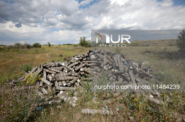 A pile of used shells is being pictured at the positions of the Motorised Rifle Battalion of the 93rd Kholodnyi Yar Separate Mechanized Brig...