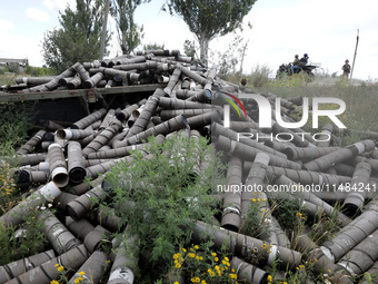 A pile of used shells is being pictured at the positions of the Motorised Rifle Battalion of the 93rd Kholodnyi Yar Separate Mechanized Brig...