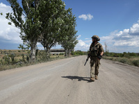 A serviceman of the Motorised Rifle Battalion of the 93rd Kholodnyi Yar Separate Mechanized Brigade of the Ukrainian Armed Forces is walking...