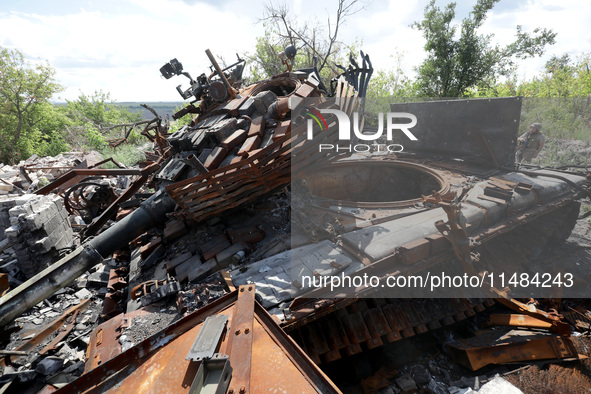 A Ukrainian tank destroyed by a Russian ZALA Lancet loitering munition during fighting in the Bakhmut direction in 2023 is at the positions...