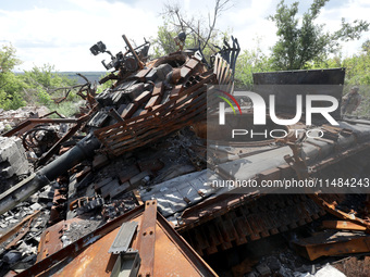 A Ukrainian tank destroyed by a Russian ZALA Lancet loitering munition during fighting in the Bakhmut direction in 2023 is at the positions...