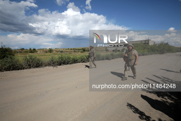 Servicemen of the Motorised Rifle Battalion of the 93rd Kholodnyi Yar Separate Mechanized Brigade of the Ukrainian Armed Forces are walking...