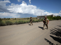 Servicemen of the Motorised Rifle Battalion of the 93rd Kholodnyi Yar Separate Mechanized Brigade of the Ukrainian Armed Forces are walking...