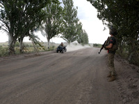 A serviceman of the Motorised Rifle Battalion of the 93rd Kholodnyi Yar Separate Mechanized Brigade of the Ukrainian Armed Forces is riding...