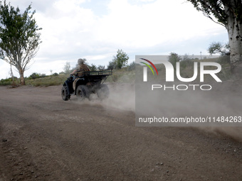 A serviceman of the Motorised Rifle Battalion of the 93rd Kholodnyi Yar Separate Mechanized Brigade of the Ukrainian Armed Forces is riding...